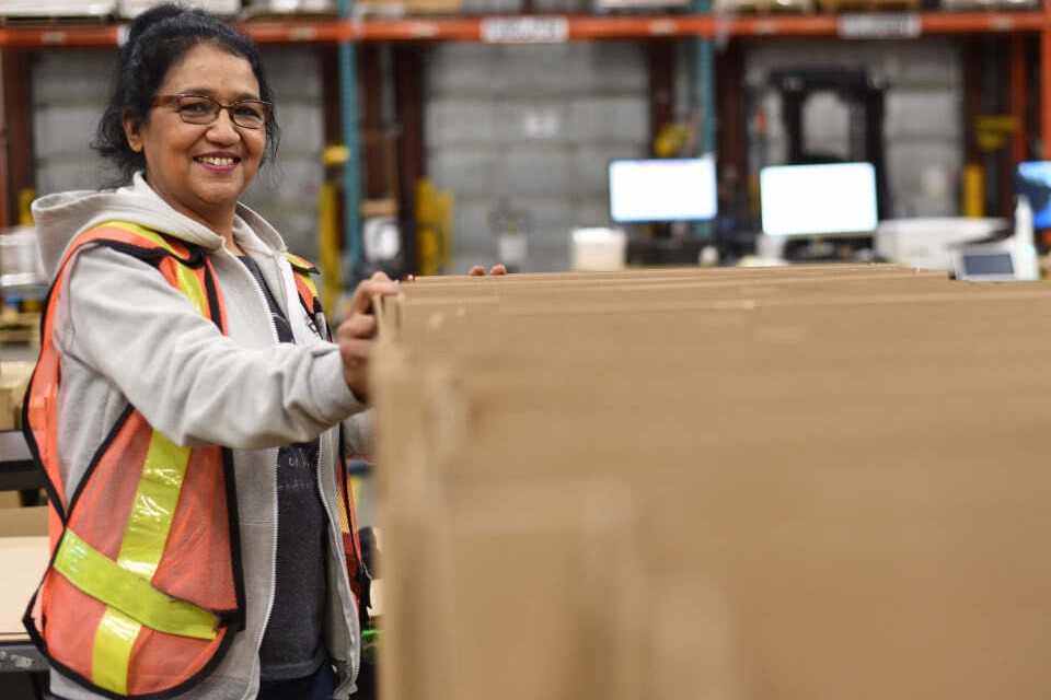 Warehouse worker in a high-visibility vest